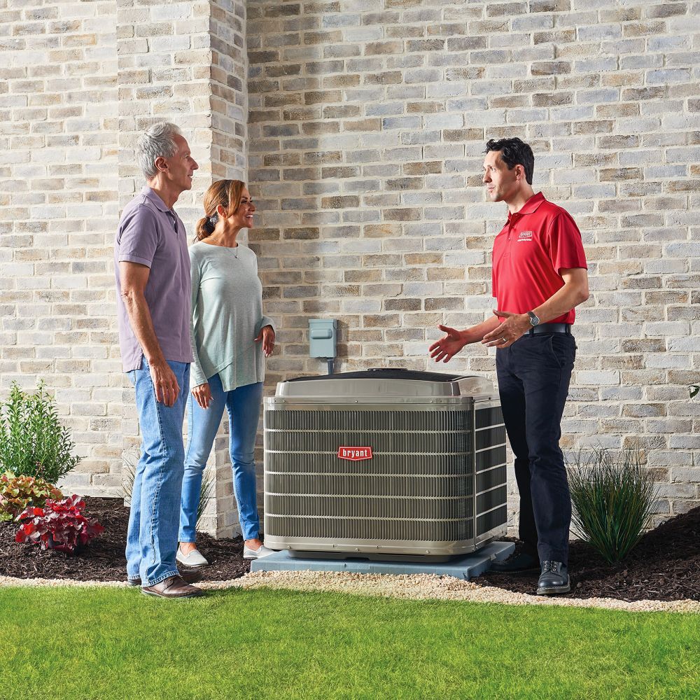 AC Technician and customers talking about best HVAC services Sarasota, 
