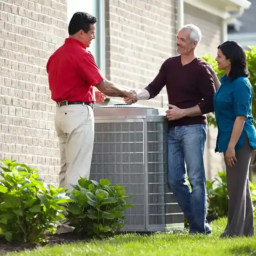 Sarasota AC service technician, shaking hands with a customer